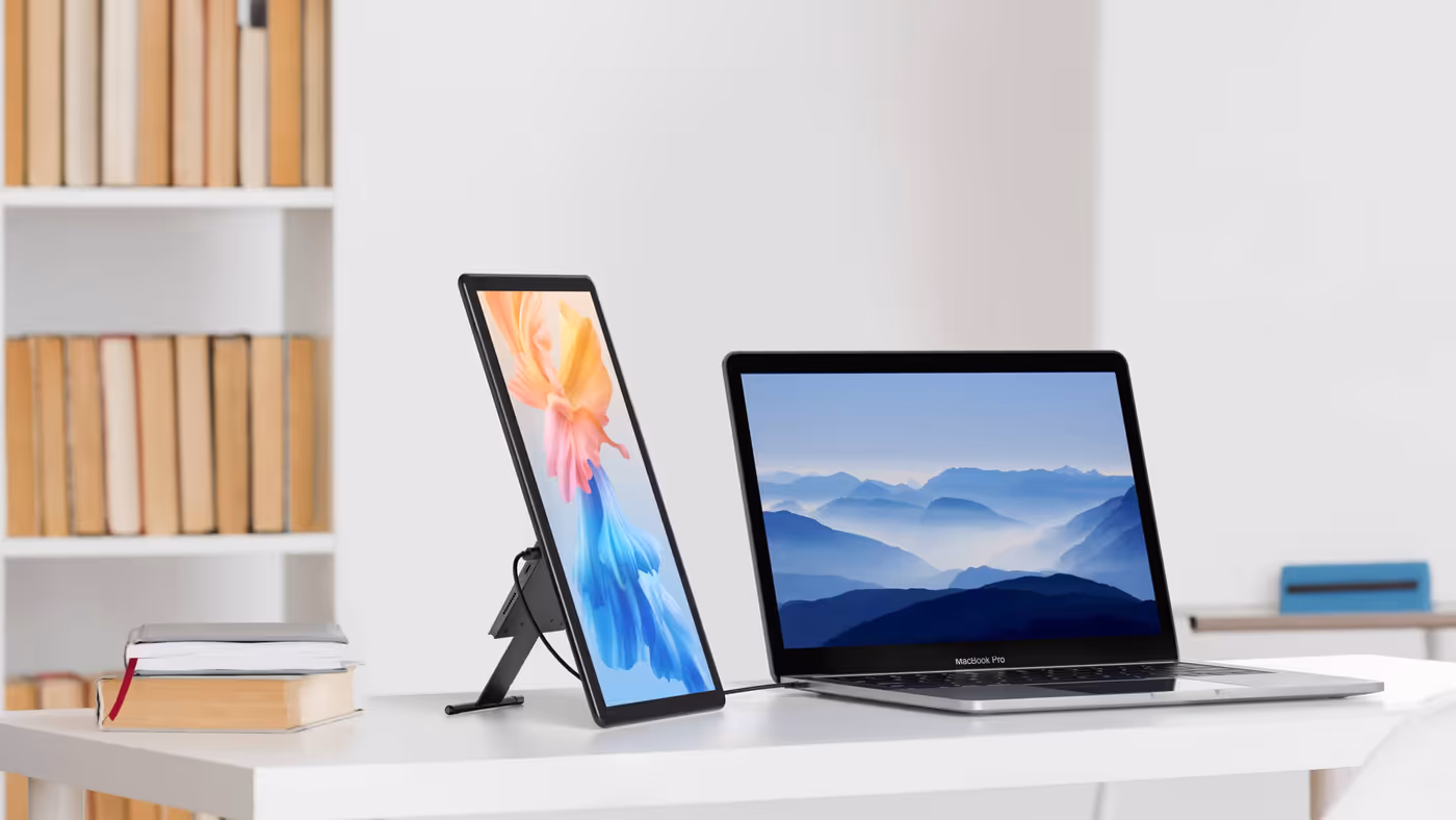 Portable monitor with integrated kickstand for hidden cable management