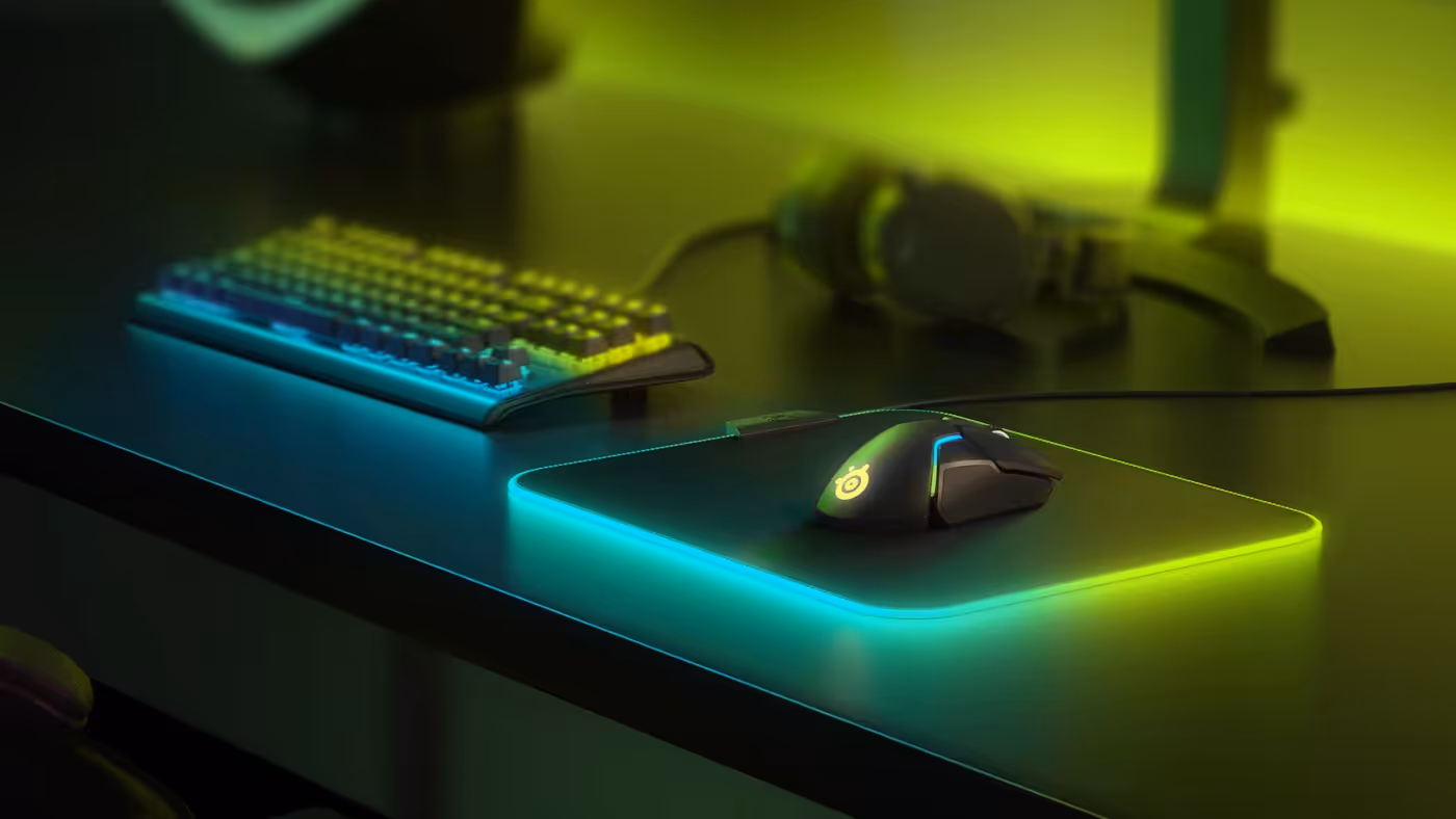 Gaming mouse;mousepads;keyboard and headset. RGB lights in the background.