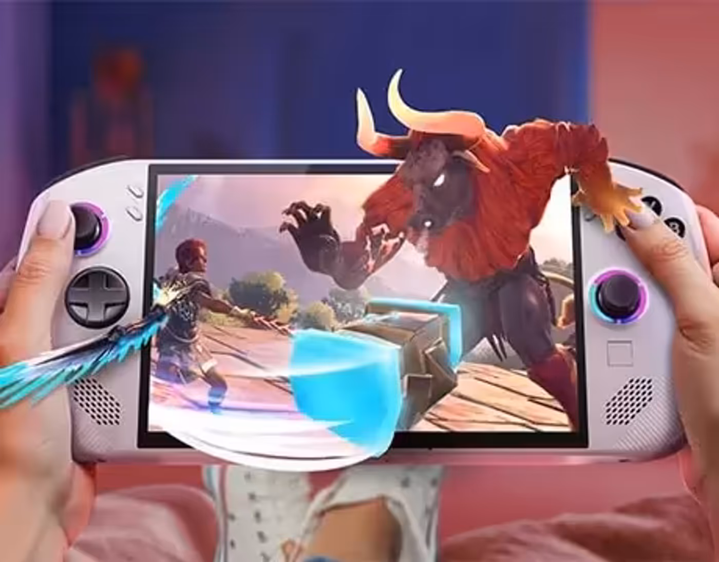 Hands holding Lenovo Legion Go S Gen 1 (8") gaming handheld playing a fantasy game with a hero battling a minotaur.