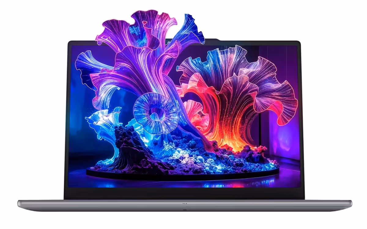 Colorful flower-like images emerge from the display of the Lenovo Yoga Pro 7i Gen 11 Aura Edition (15” Intel).