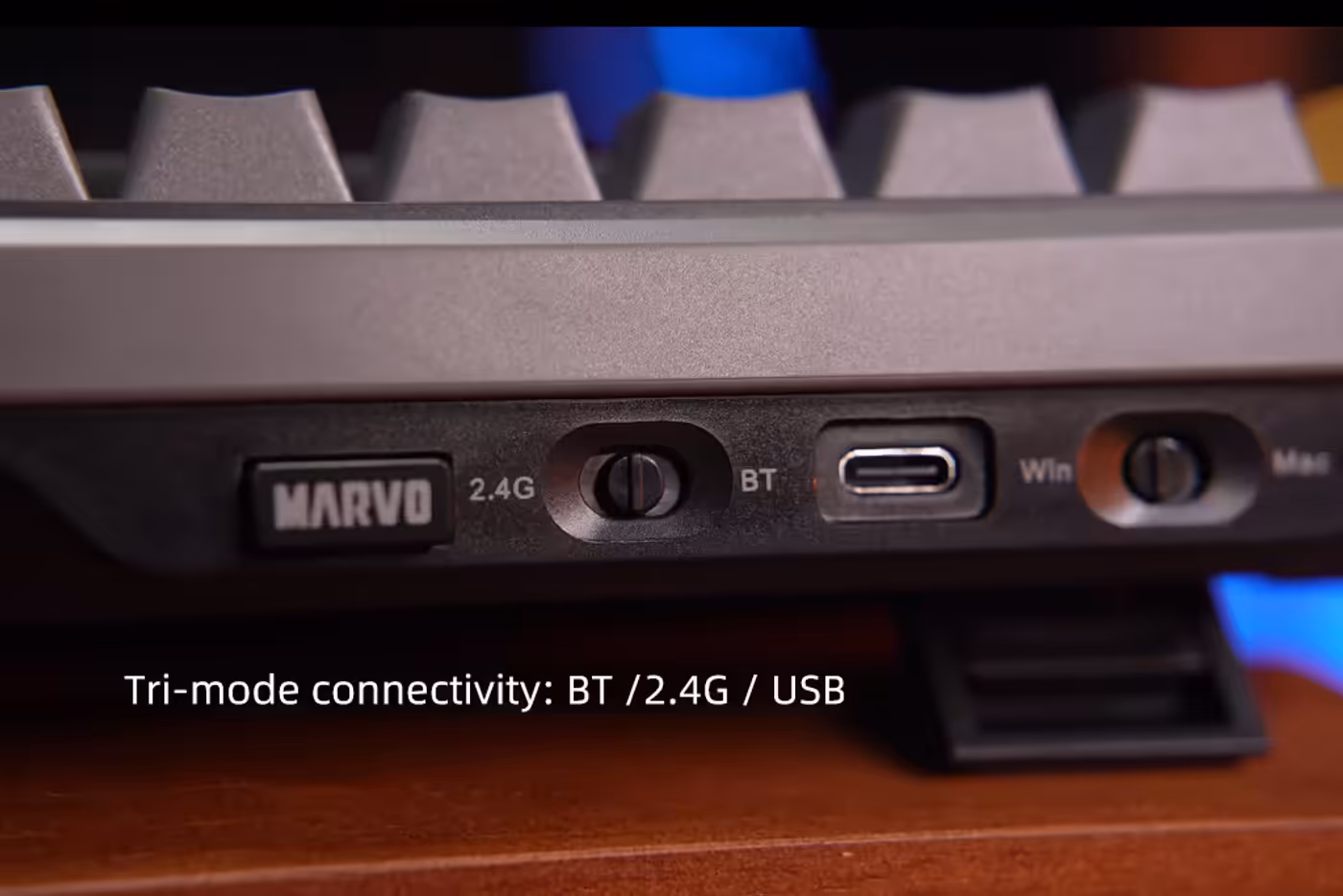 Mechanical keyboard highlighting the various wireless and wired connection modes