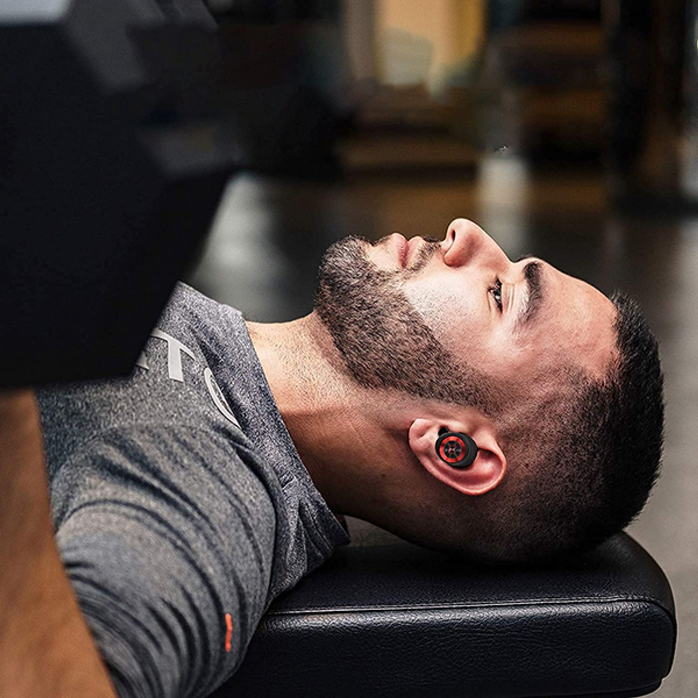 Monster AirLinks earbuds being worn during a workout