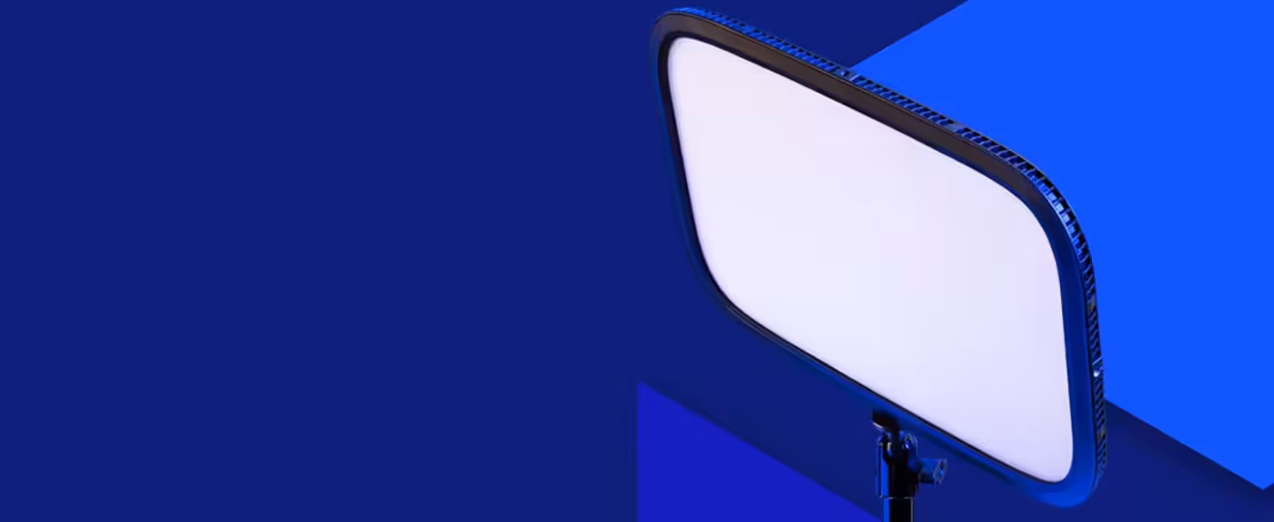 Elgato Key Light illuminating a creator in front of the Green Screen MT