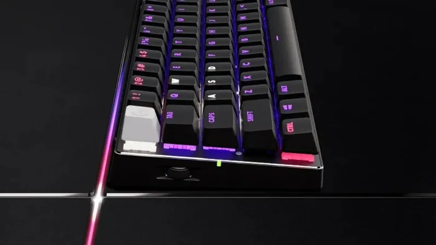 Focused gaming setup showing volume roller and game mode switch