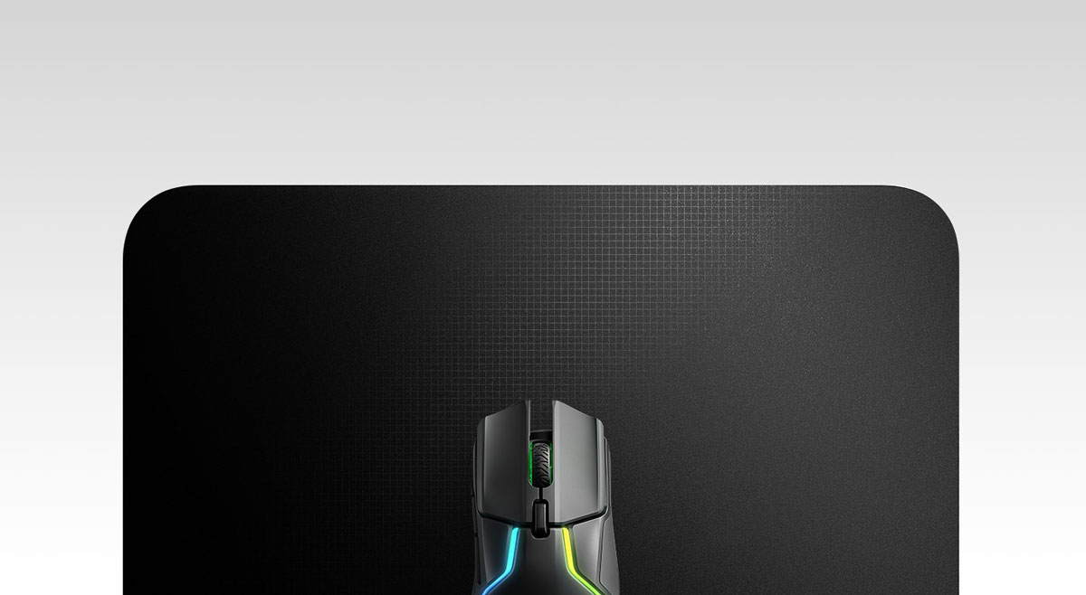 Surface of Steelseries QCK Heavy gaming mousepad showing smooth texture for accuracy
