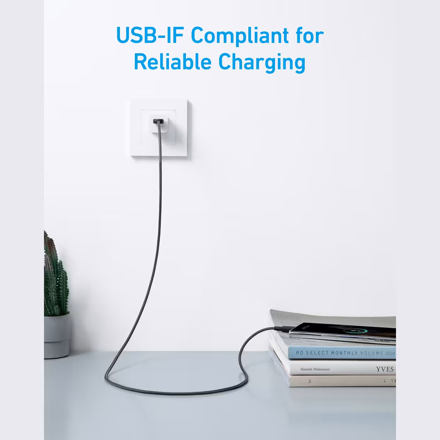 Anker 322 cable charging a phone from a wall socket