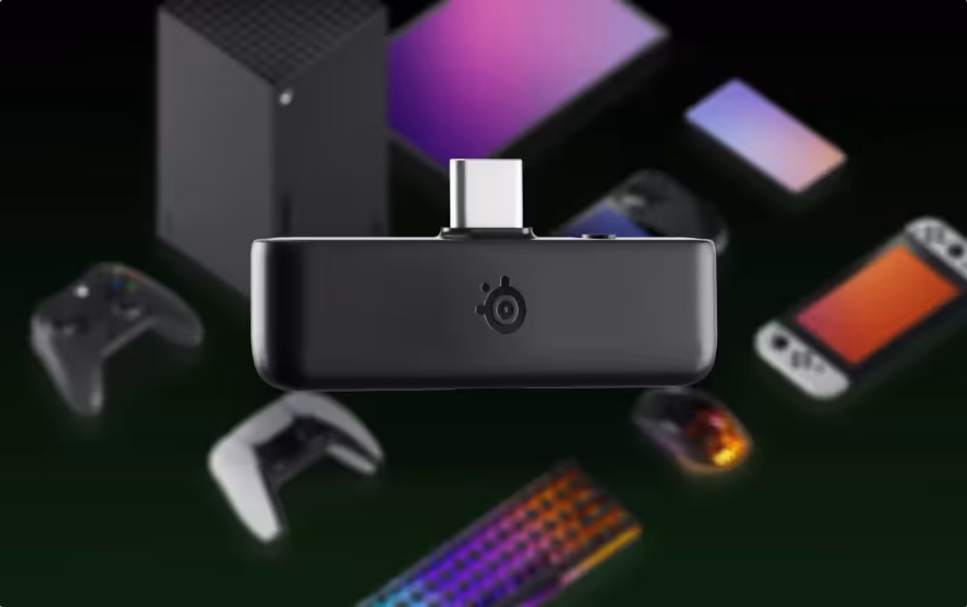 Dongle for Arctis Nova 5 white;in the background visible different devices that are compatible with the dongle.