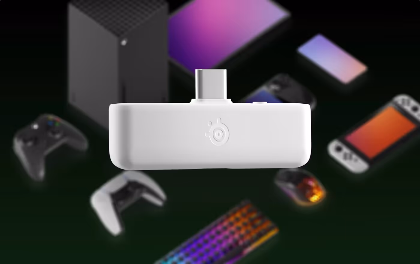 Dongle for Arctis Nova 5 white;in the background visible different devices that are compatible with the dongle.