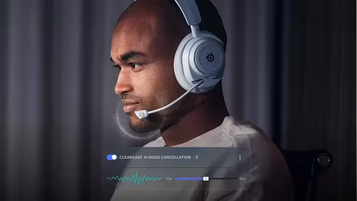 A man wearing a white gaming headset with a microphone, shown using noise cancellation.