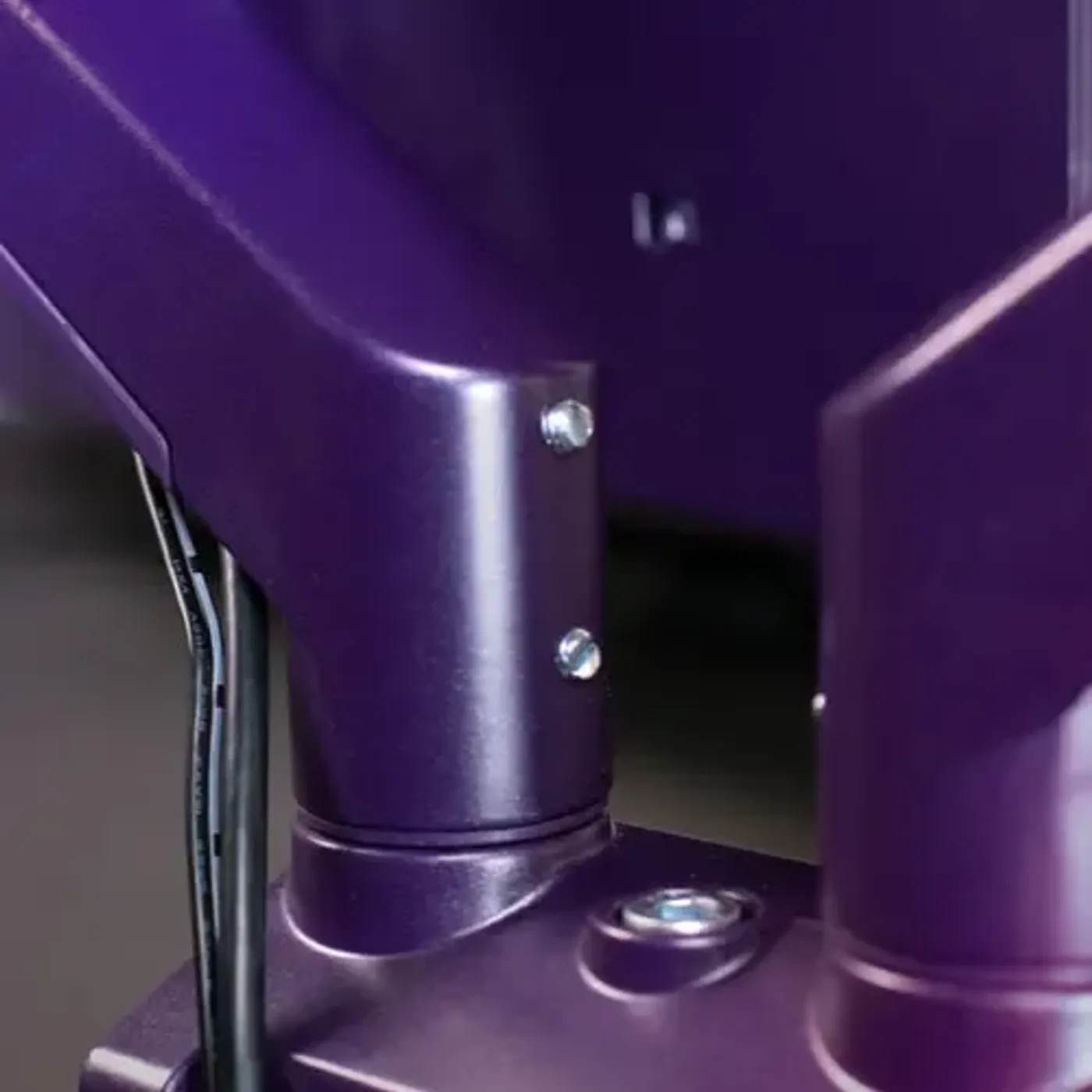 Monitor arm showing flexible 360-degree rotation and 180-degree wall protection