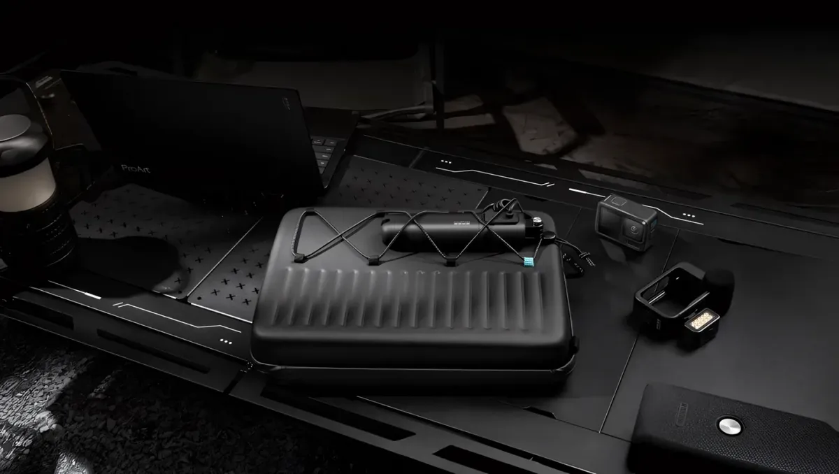 Rugged black laptop sleeve with storage for accessories and GoPro gear