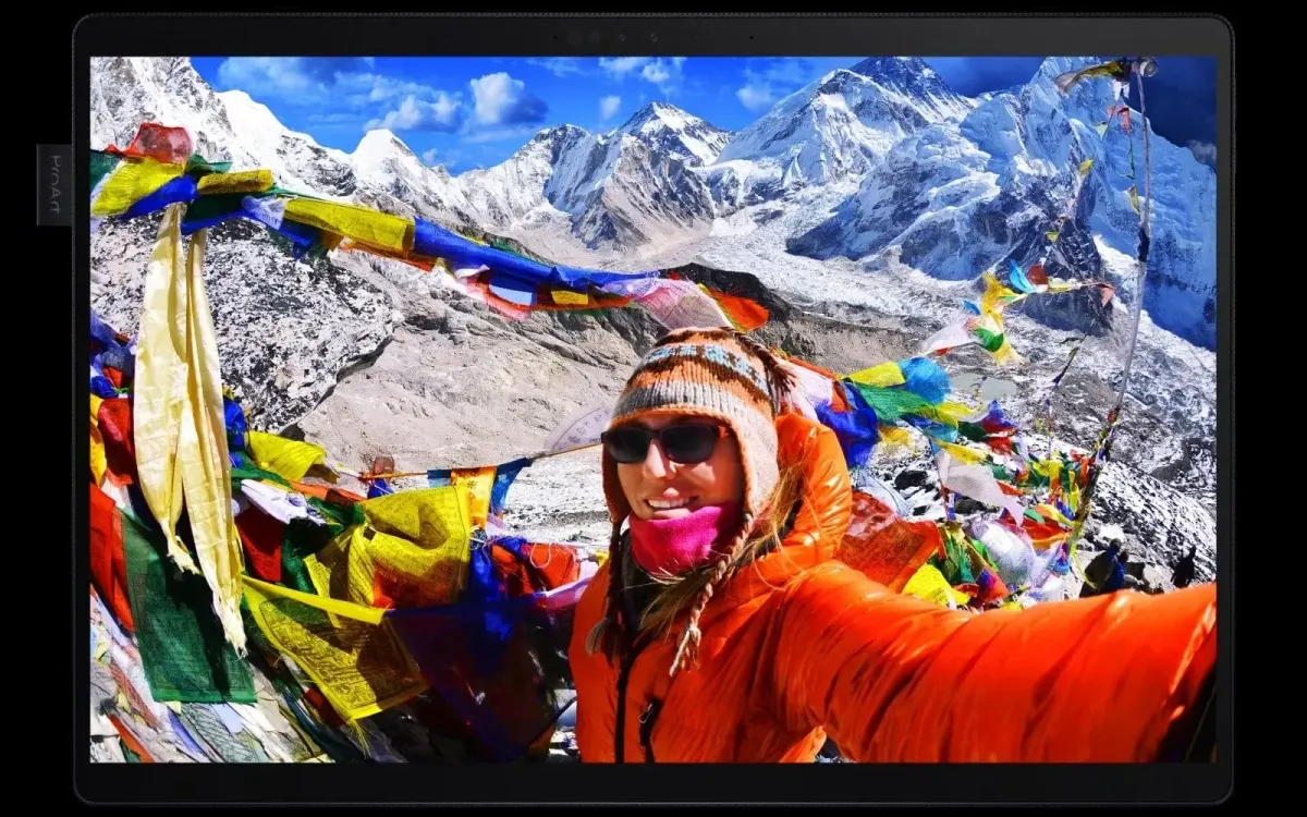 A front facing product photo with a woman travel selfie in-screen.