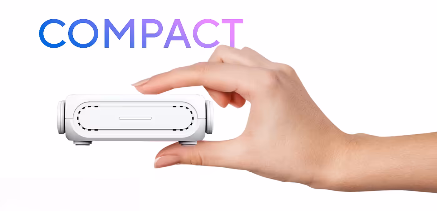 A hand holding the RT-BE58 Go between two fingers, emphasizing its compact size.