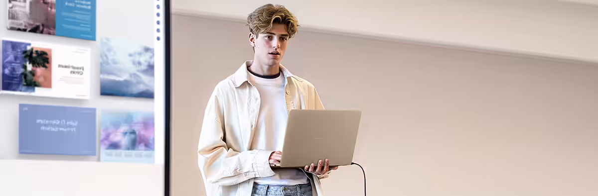 Person using ASUS Zenbook 14 keyboard designed for comfortable typing