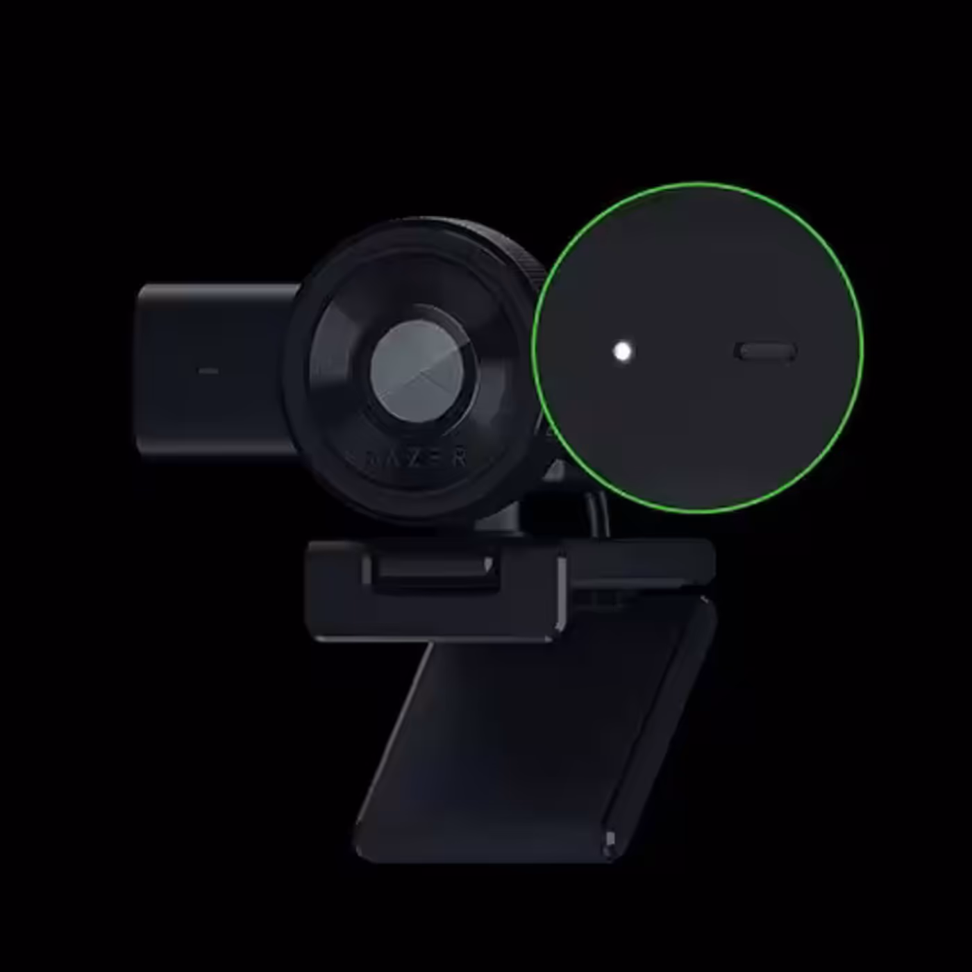 A black Razer gaming camera with a clip, featuring a large lens, a circular green-lit indicator, and a sleek, modern design.