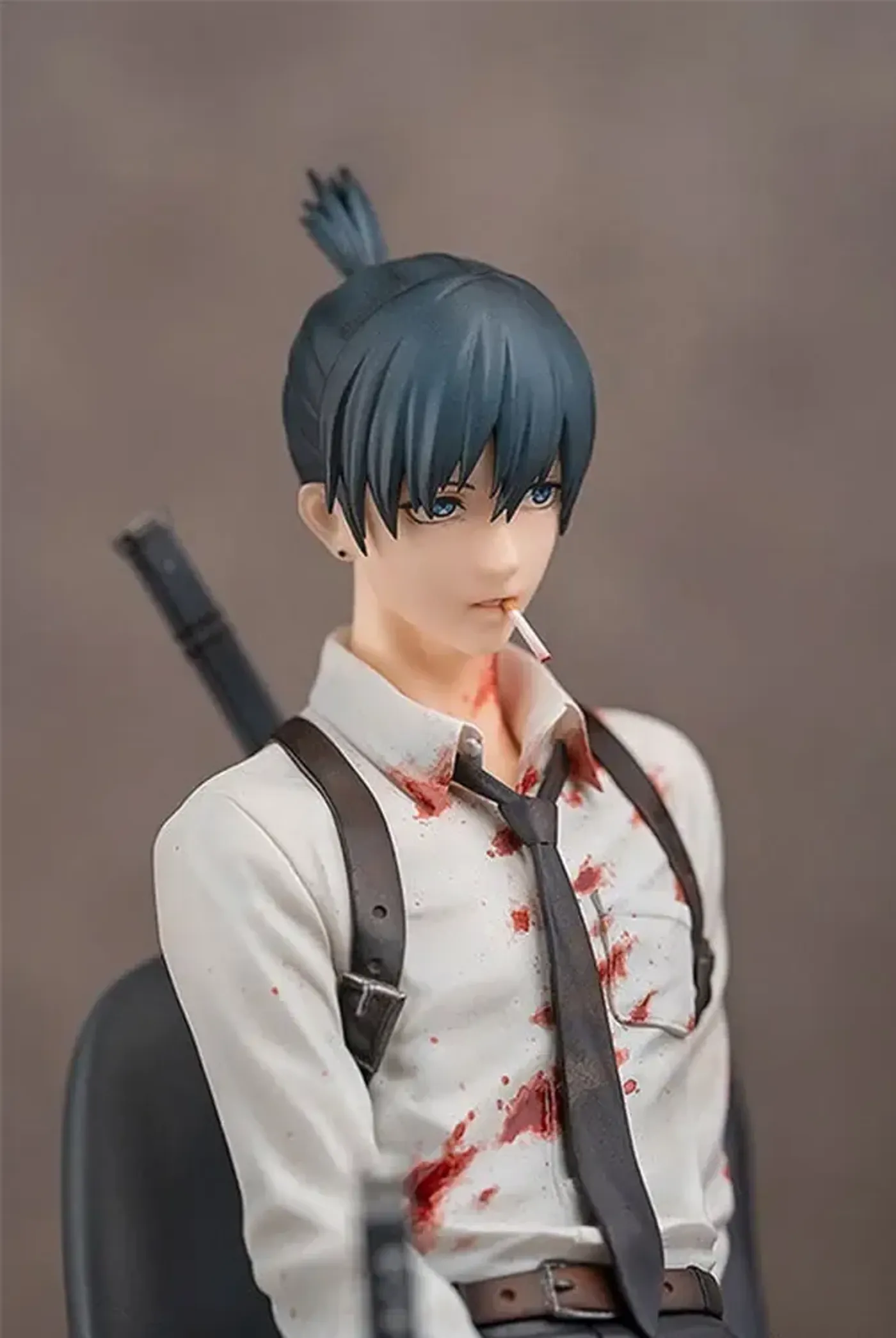 Chainsaw Man Aki Hayakawa 1/7 scale figure seated in his bloodied uniform