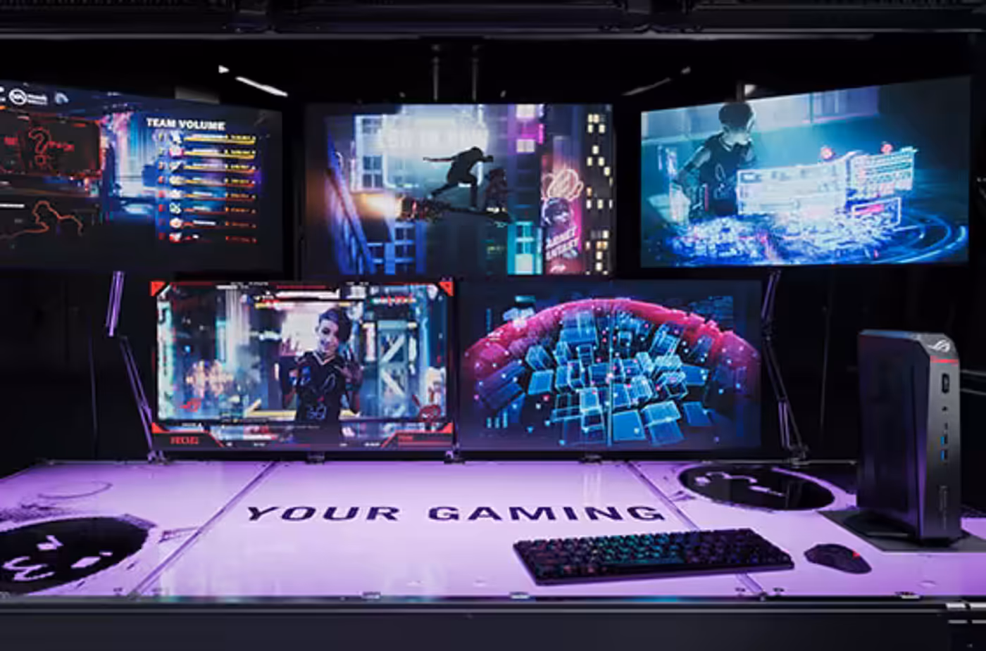 Best gaming mini PC ROG GR70 on a desk with five monitor set-up