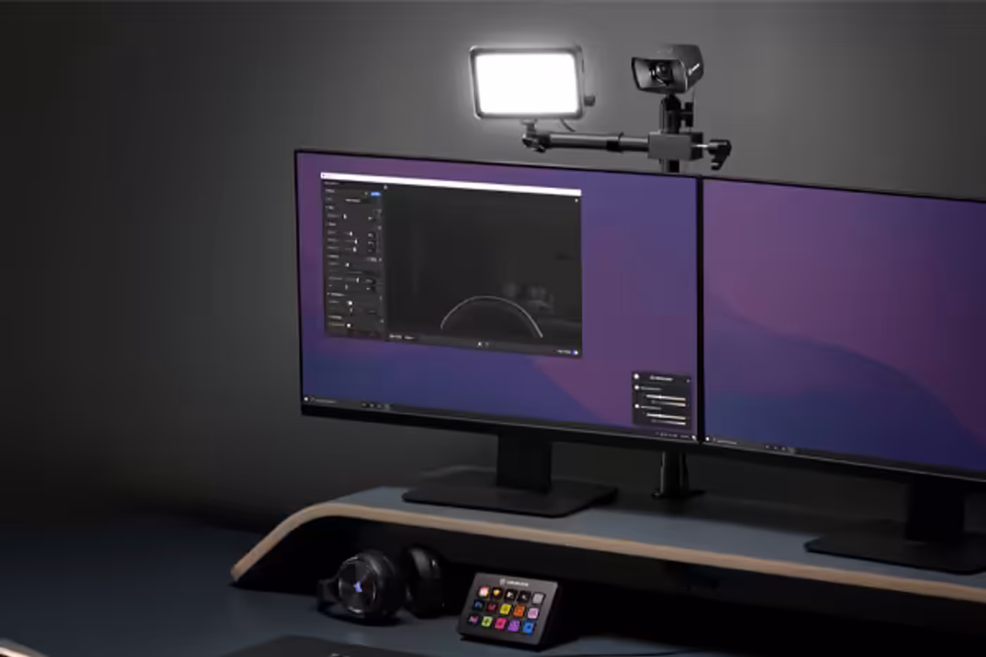 Key Light Mini set up on a studio desk beside streaming equipment