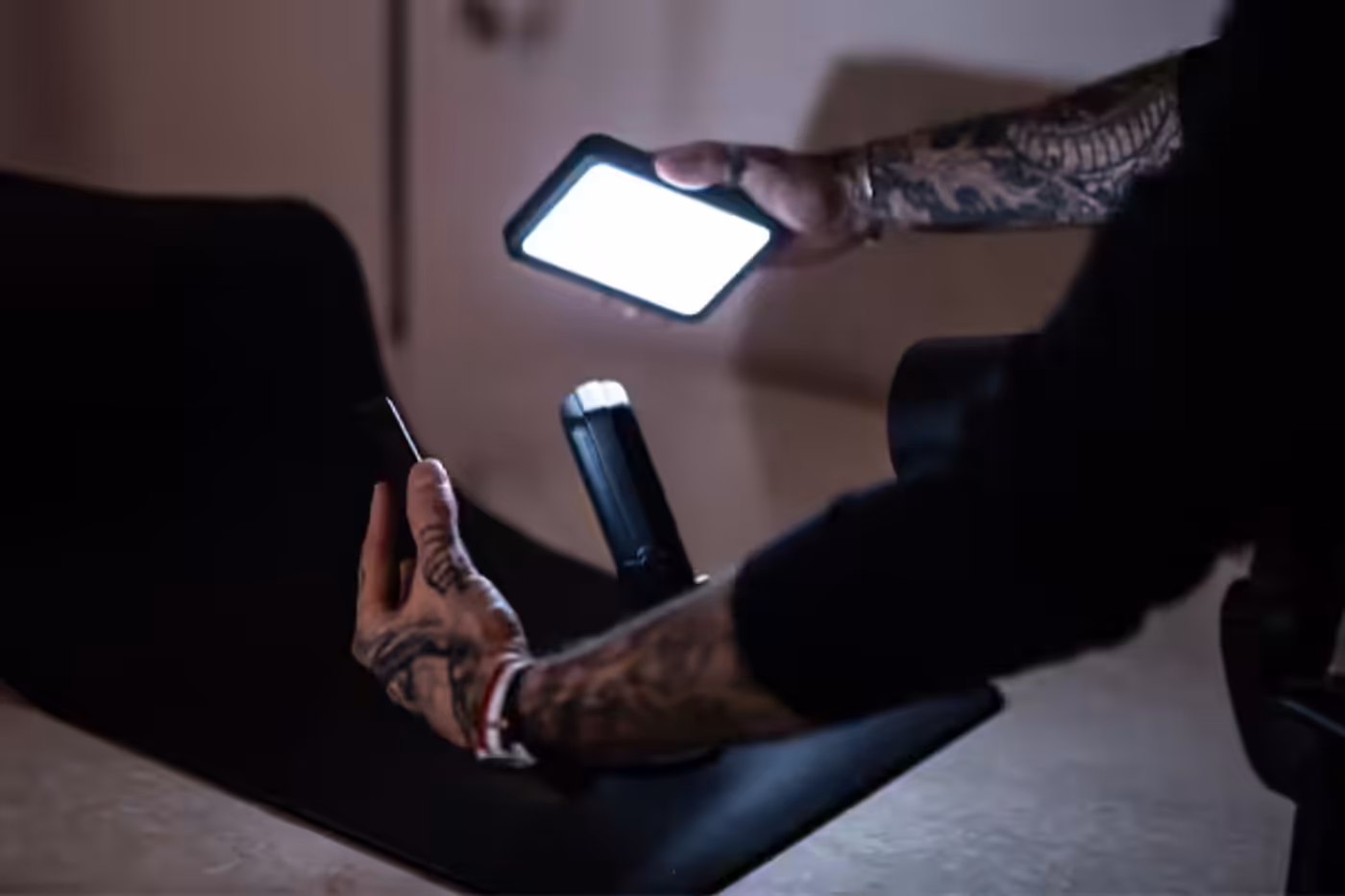 Key Light Mini positioned on a desk in a handheld orientation