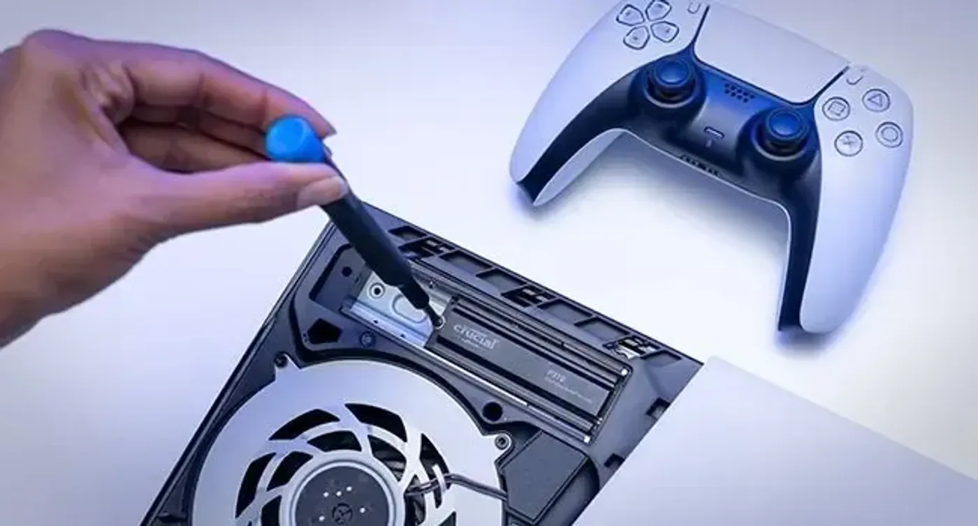 Crucial P310 SSD with heatsink installed in PlayStation 5 for optimal performance