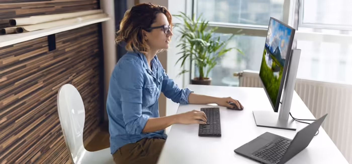 Quiet wireless keyboard and symmetrical mouse designed for comfortable daily use