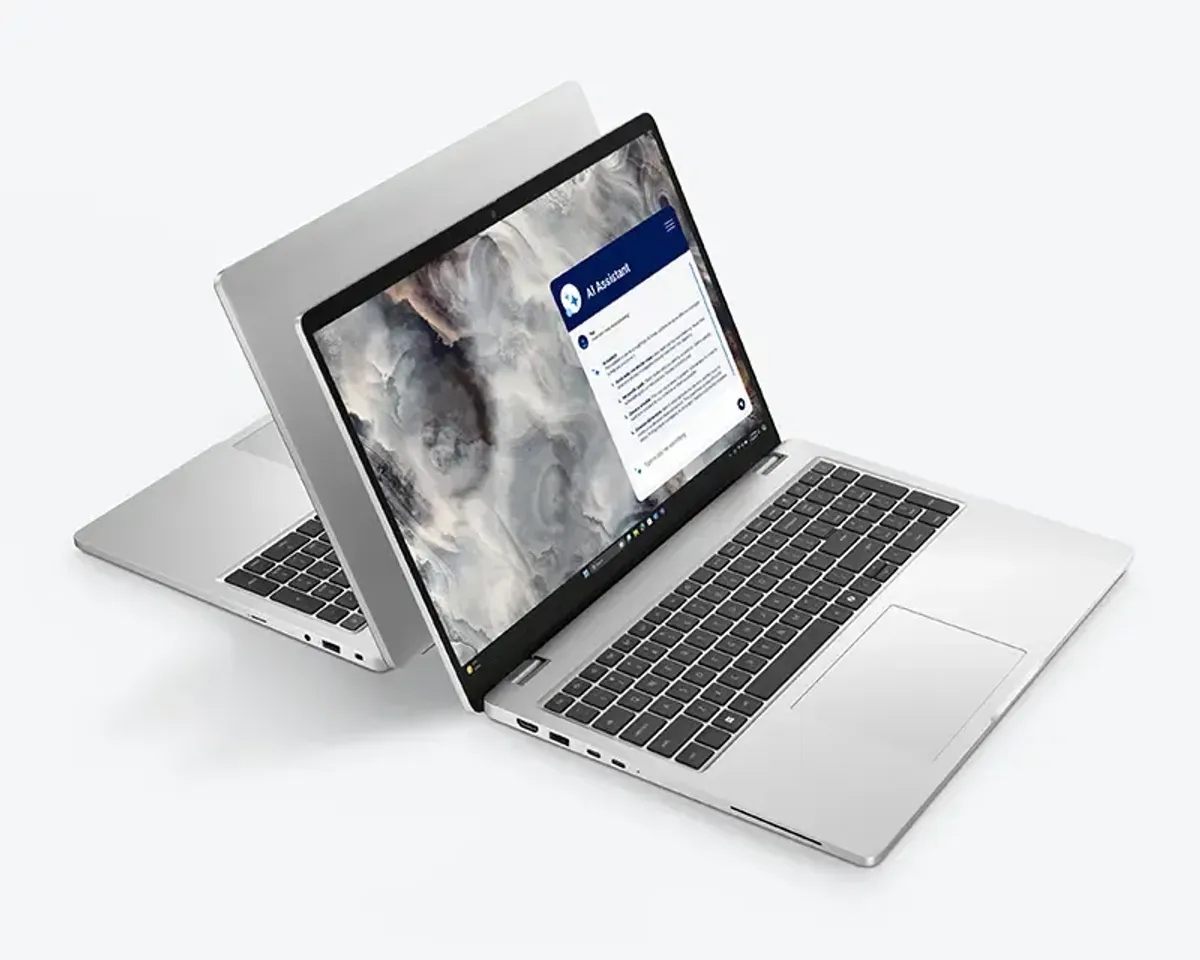 Laptop display with slim bezels and large, ergonomic touchpad surface