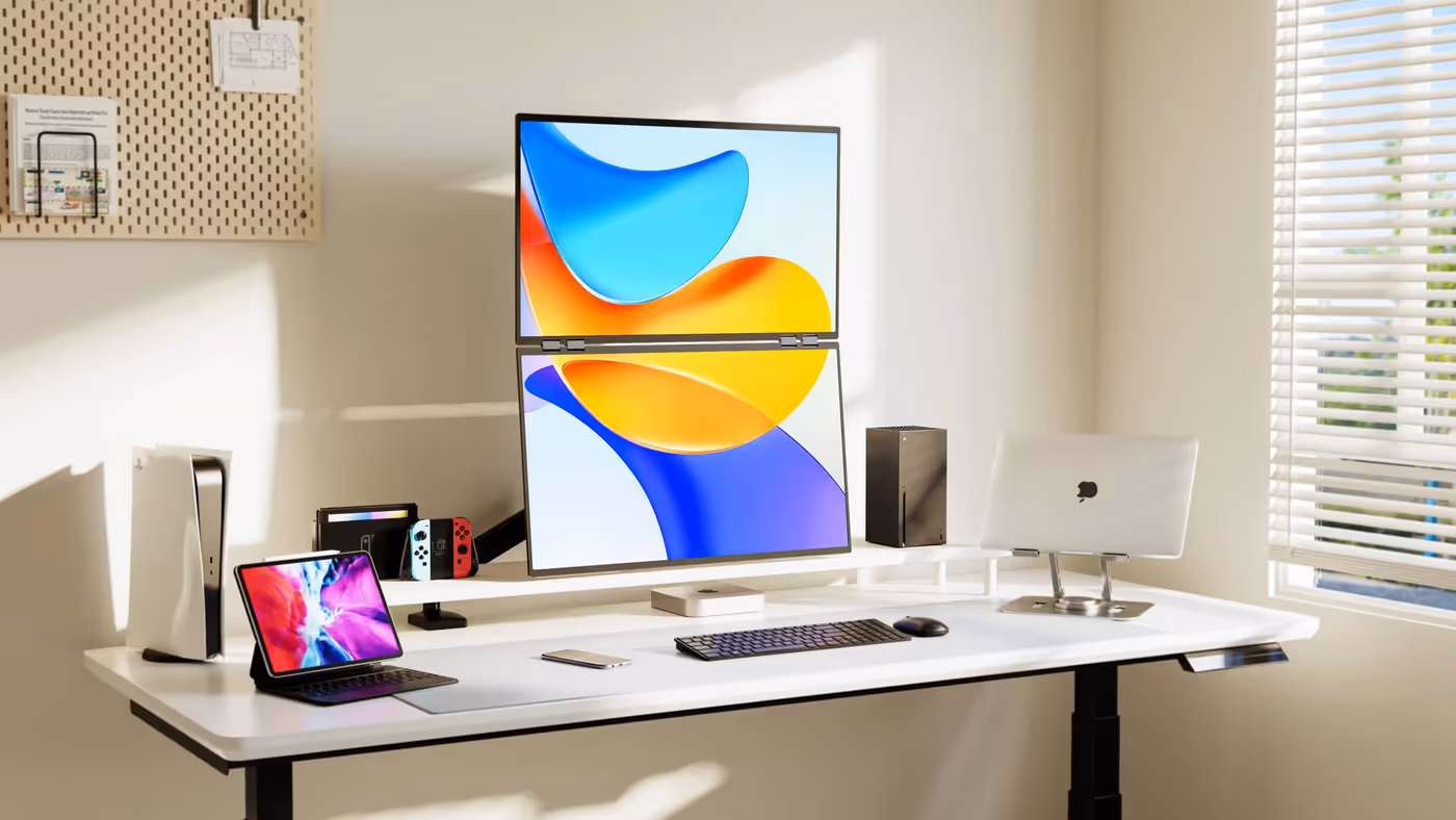 Dual monitor setup connected to multiple peripheral devices