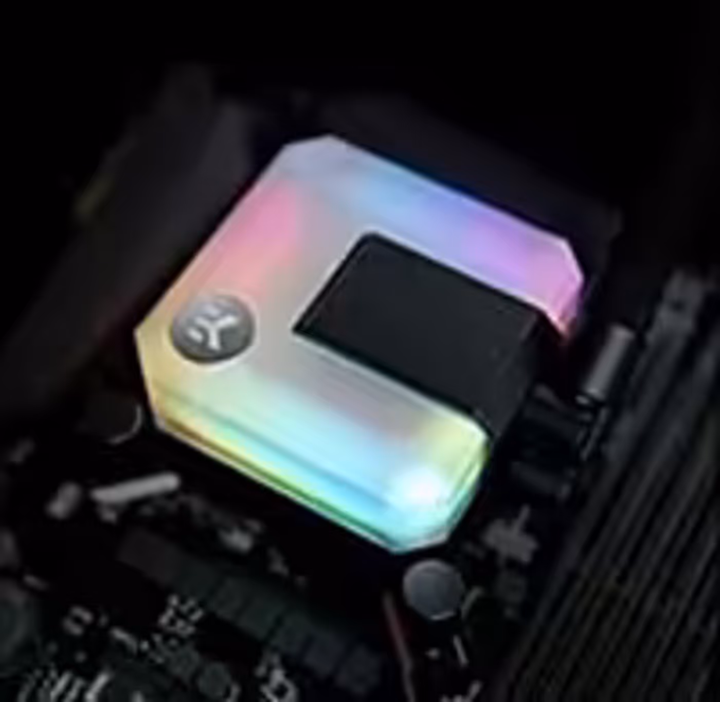 Frosted acrylic top of the EK AIO CPU block lit by its D-RGB LEDs