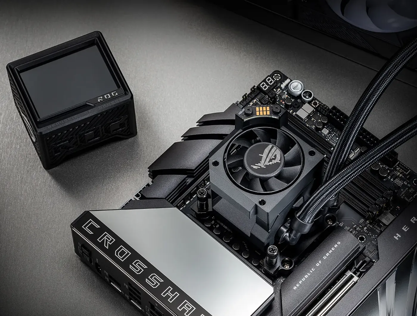 ROG Ryujin III 360 ARGB Extreme installed on the ROG Crosshair X870E Hero, with the Fan Vent opened to reveal the VRM Fan.
