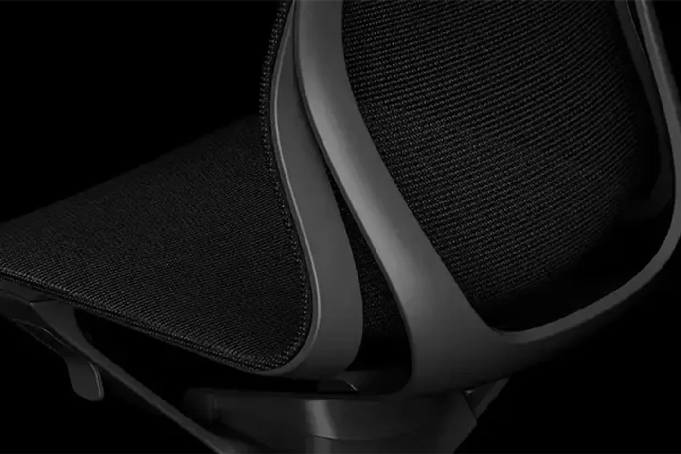 Close-up of the curved lines that define the Enova Aria chair frame