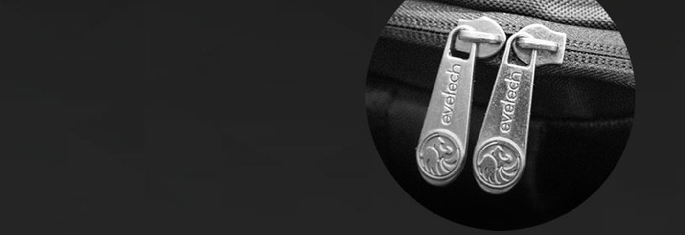 Close view of the engraved zipper pulls on the Evetech NEO backpack