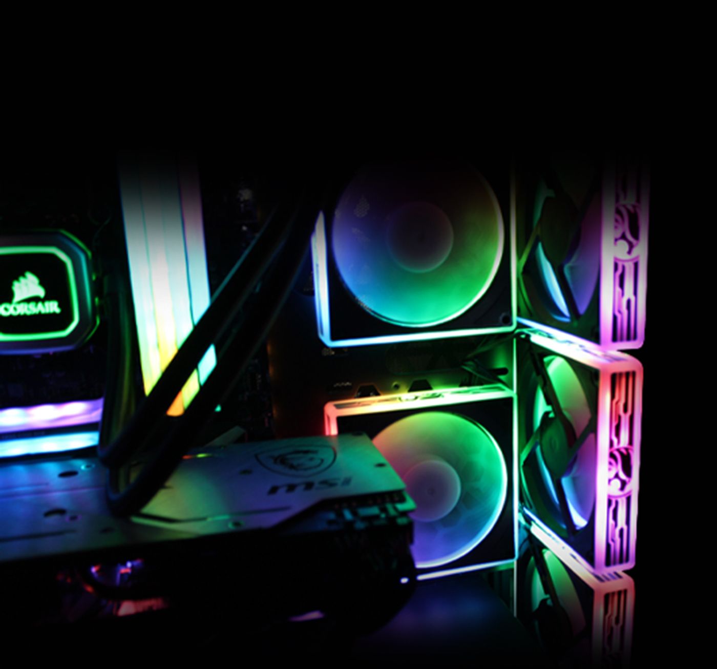 Evetech TRIO Elite RGB case shown as the centrepiece of a gaming desk