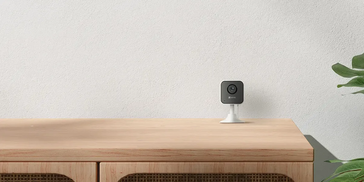 EZVIZ H1C smart indoor wireless security camera showcasing sleek design and features