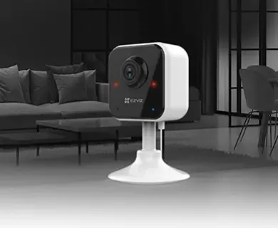 Night vision view of EZVIZ H1C camera illuminating a dark room