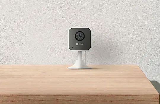 EZVIZ H1C indoor WiFi security camera in use, capturing wide-angle footage