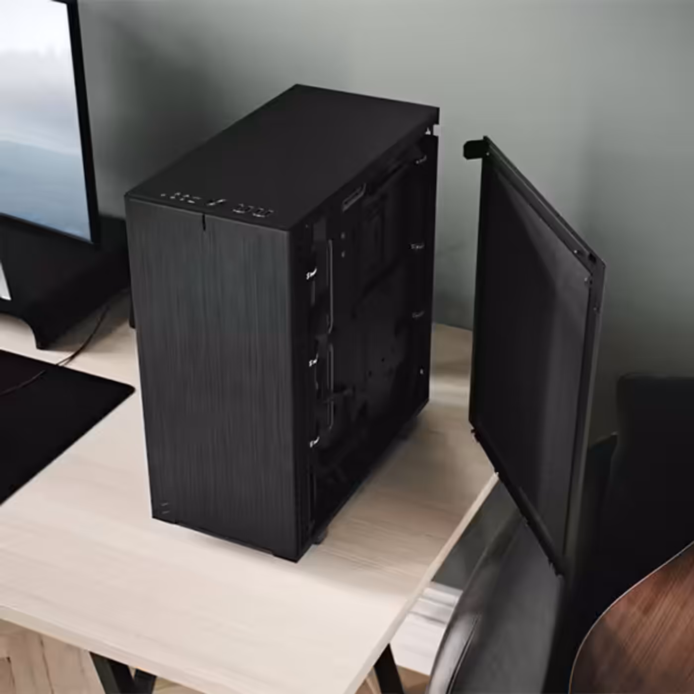 Fractal Design Define 7 Compact showing top panel ventilation and sound-dampening construction
