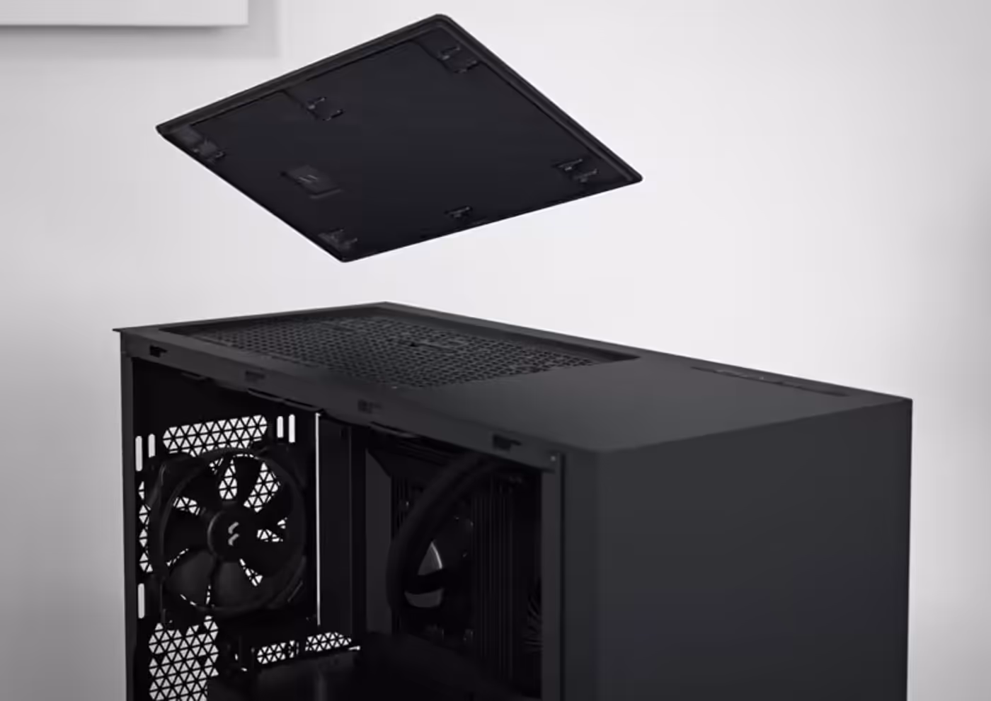 The removable top panel of the Pop XL Silent lifted off to show the fan mounts