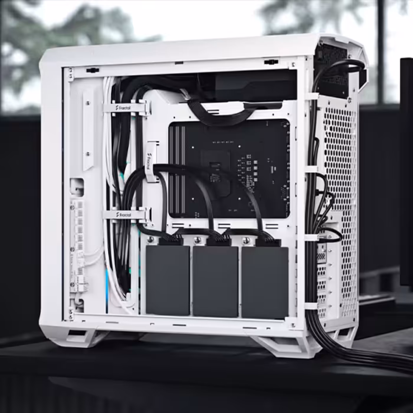 Internal view of cable management and drive mounting in the Fractal Design case