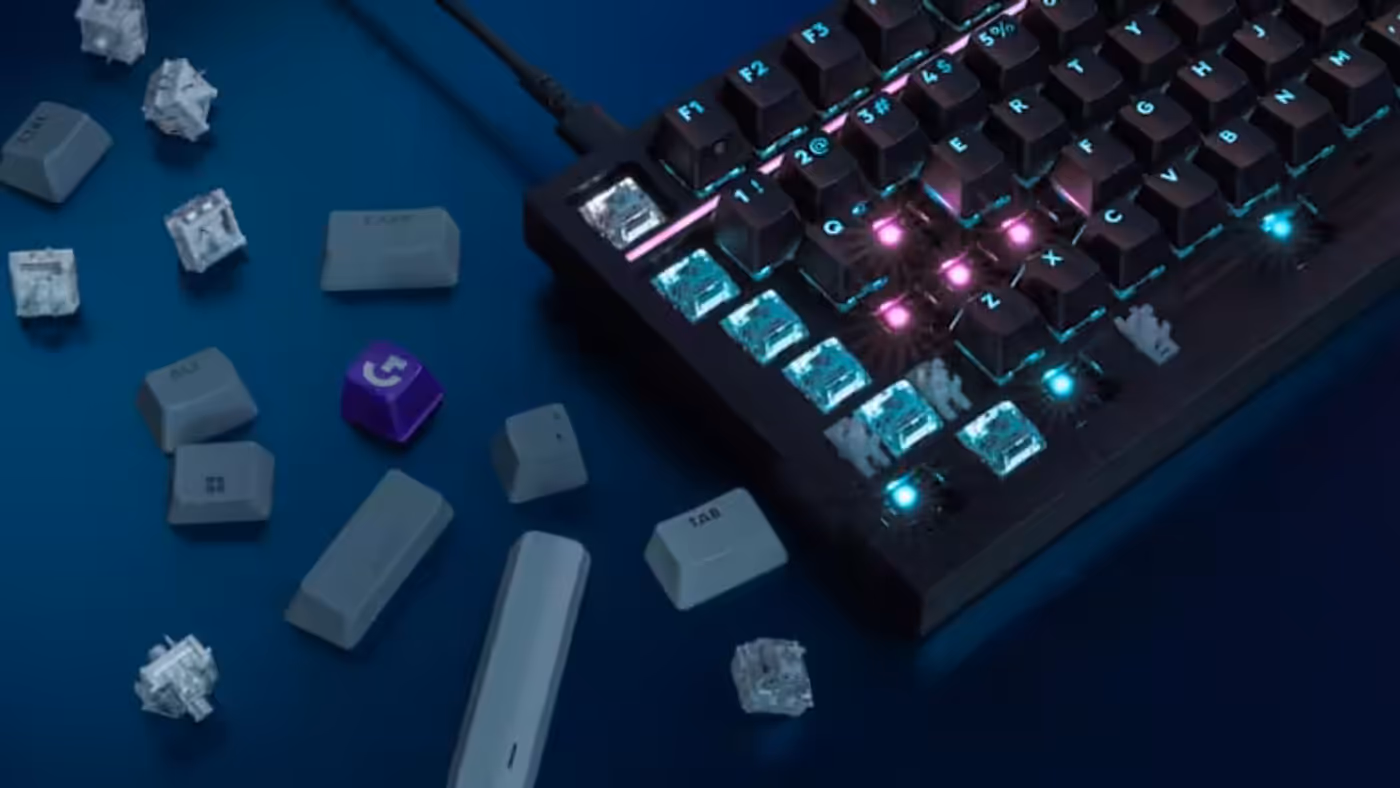 Keyboard close-up showing hot-swappable switch area for customization