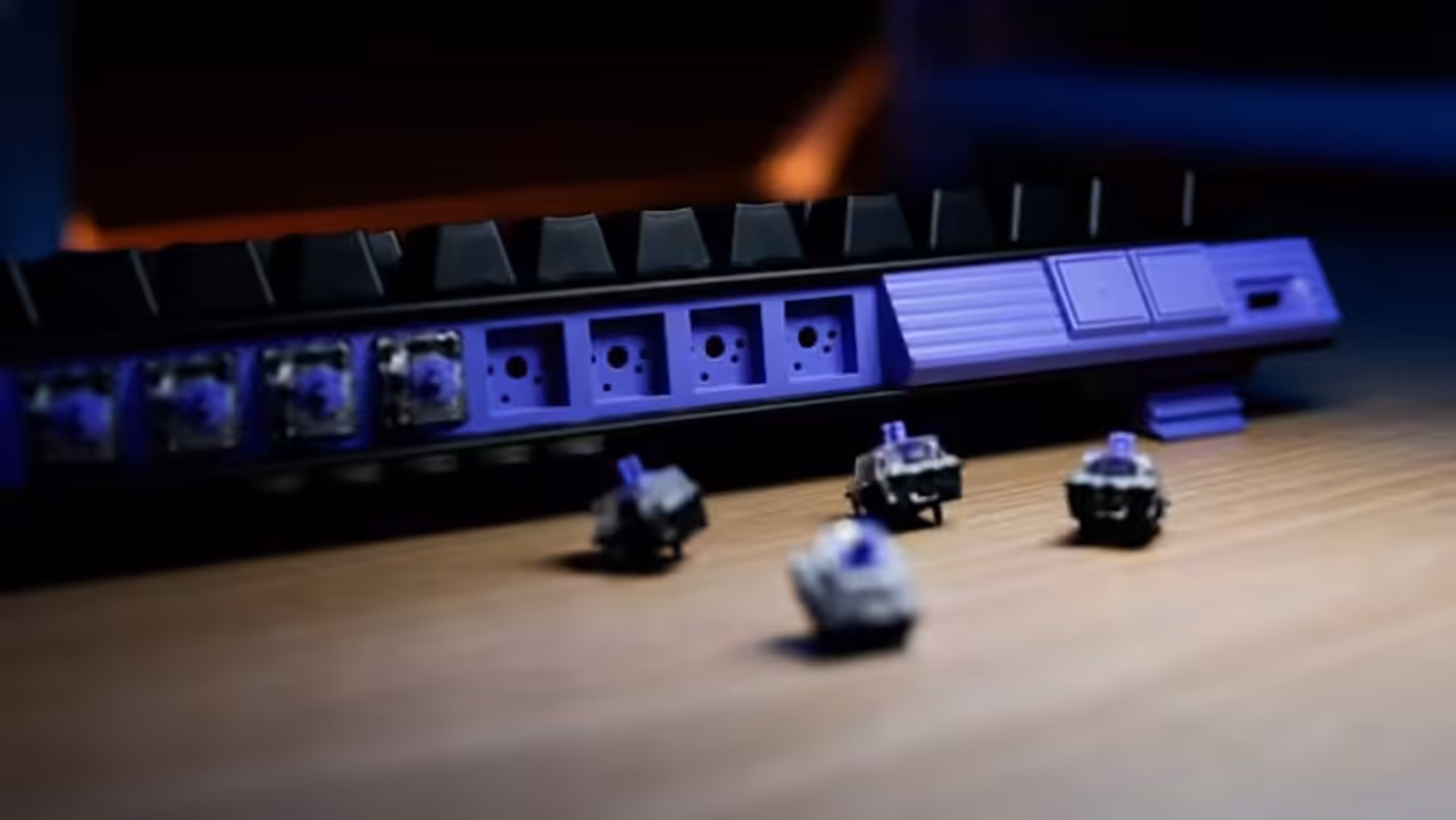 Keyboard back panel with built-in storage for switches and rings