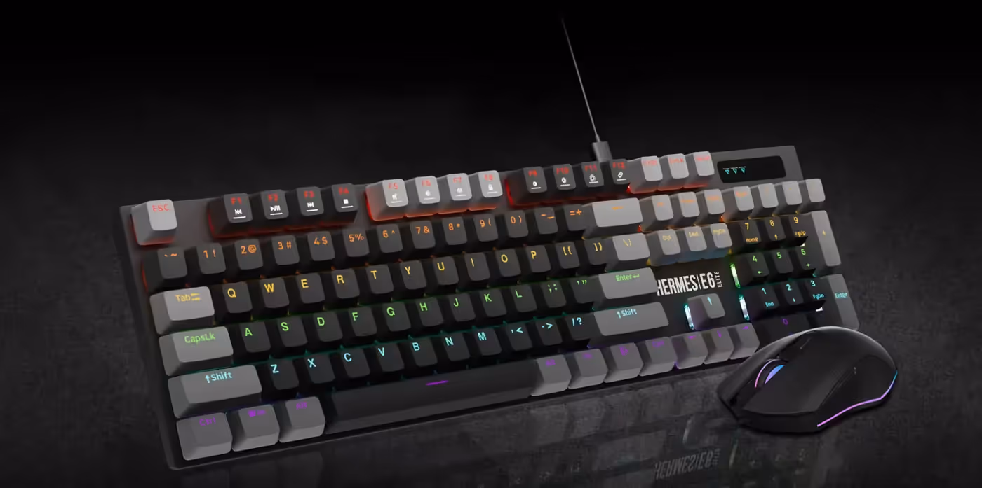Hermes E6 ELITE gaming mouse lit with multi-colour lighting beside the illuminated keyboard