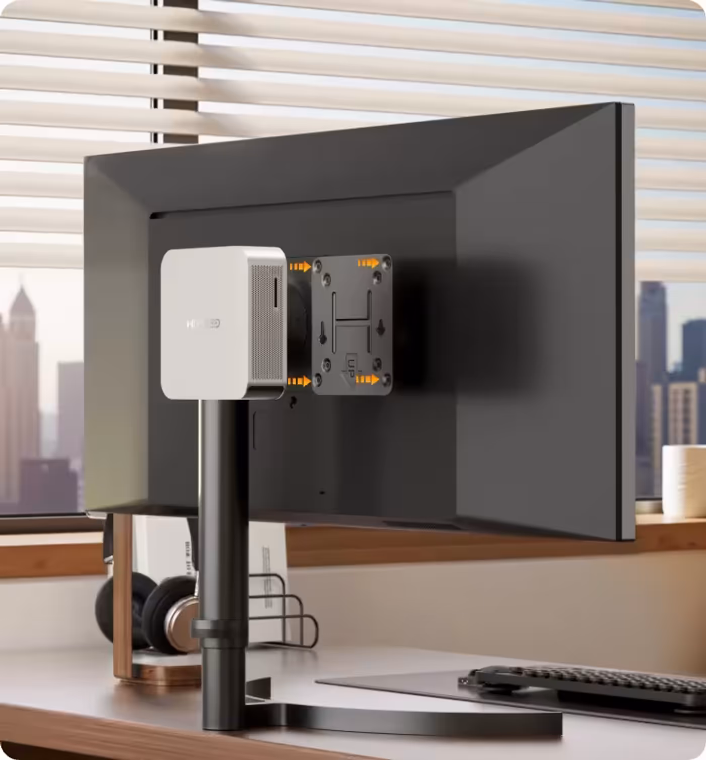 GEEKOM A8 Max showing VESA mount compatibility for space-saving installation