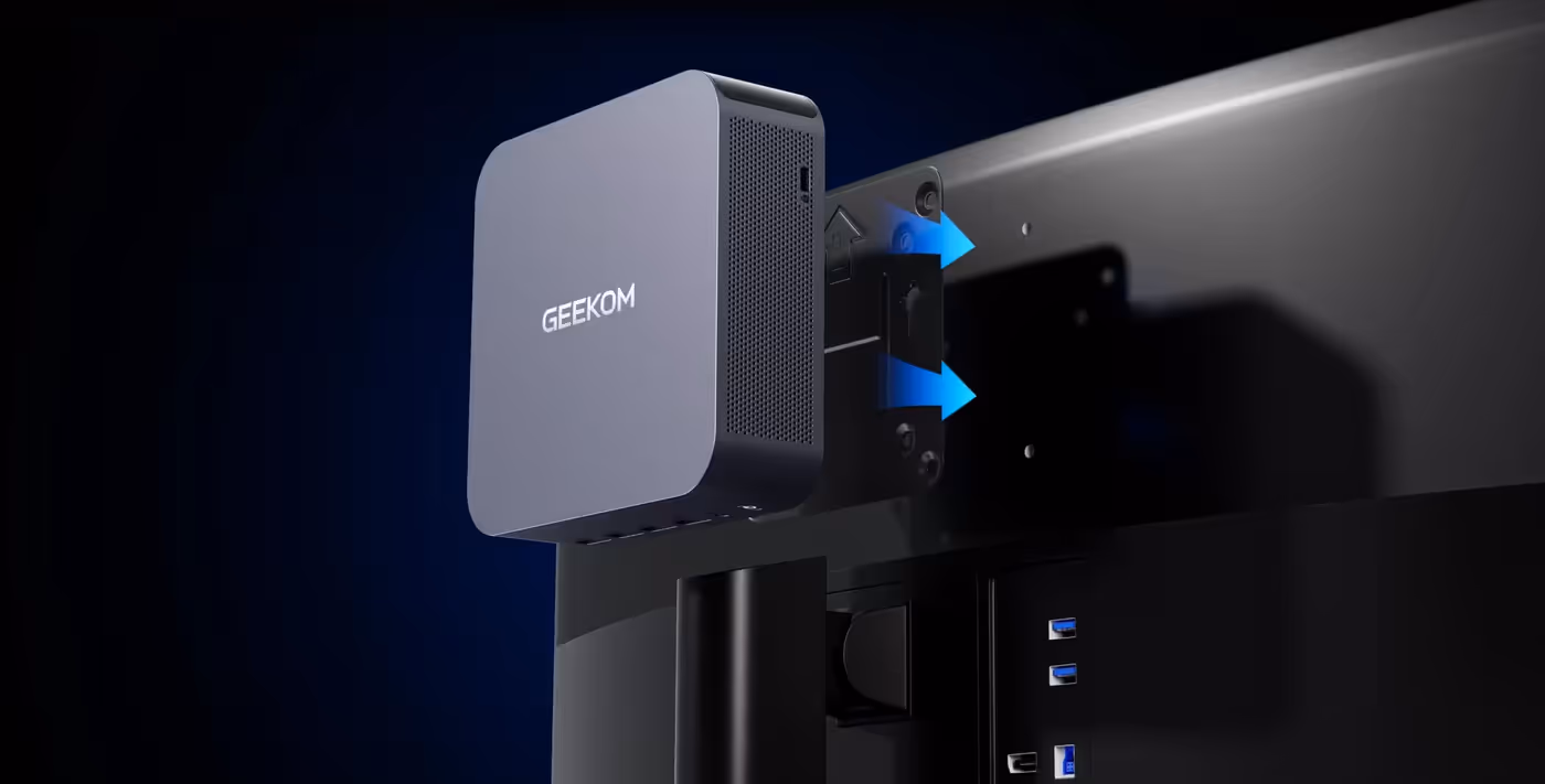 Mini PC mounted behind a monitor using the VESA mounting system