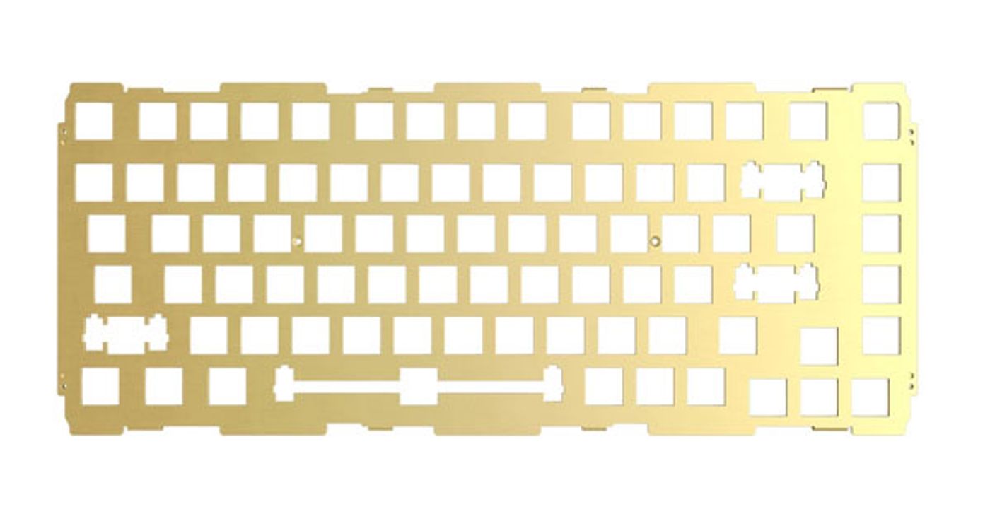 Brushed-gold brass switch plate for the GMMK Pro shown flat against a white background