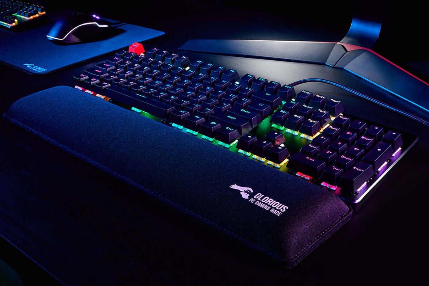 Black Glorious gaming wrist rest with stitched edges viewed from above