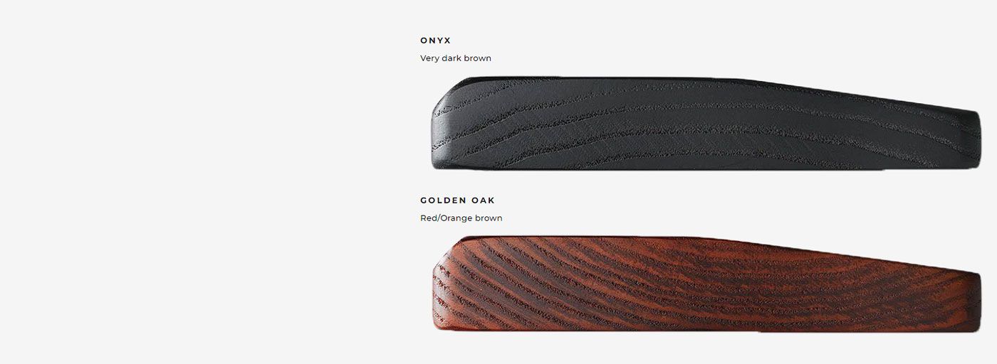 Onyx and Golden Oak versions of the Glorious wooden wrist rest side by side