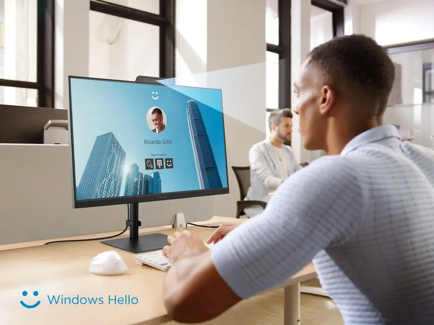 Monitor demonstrating Windows Hello facial recognition login feature