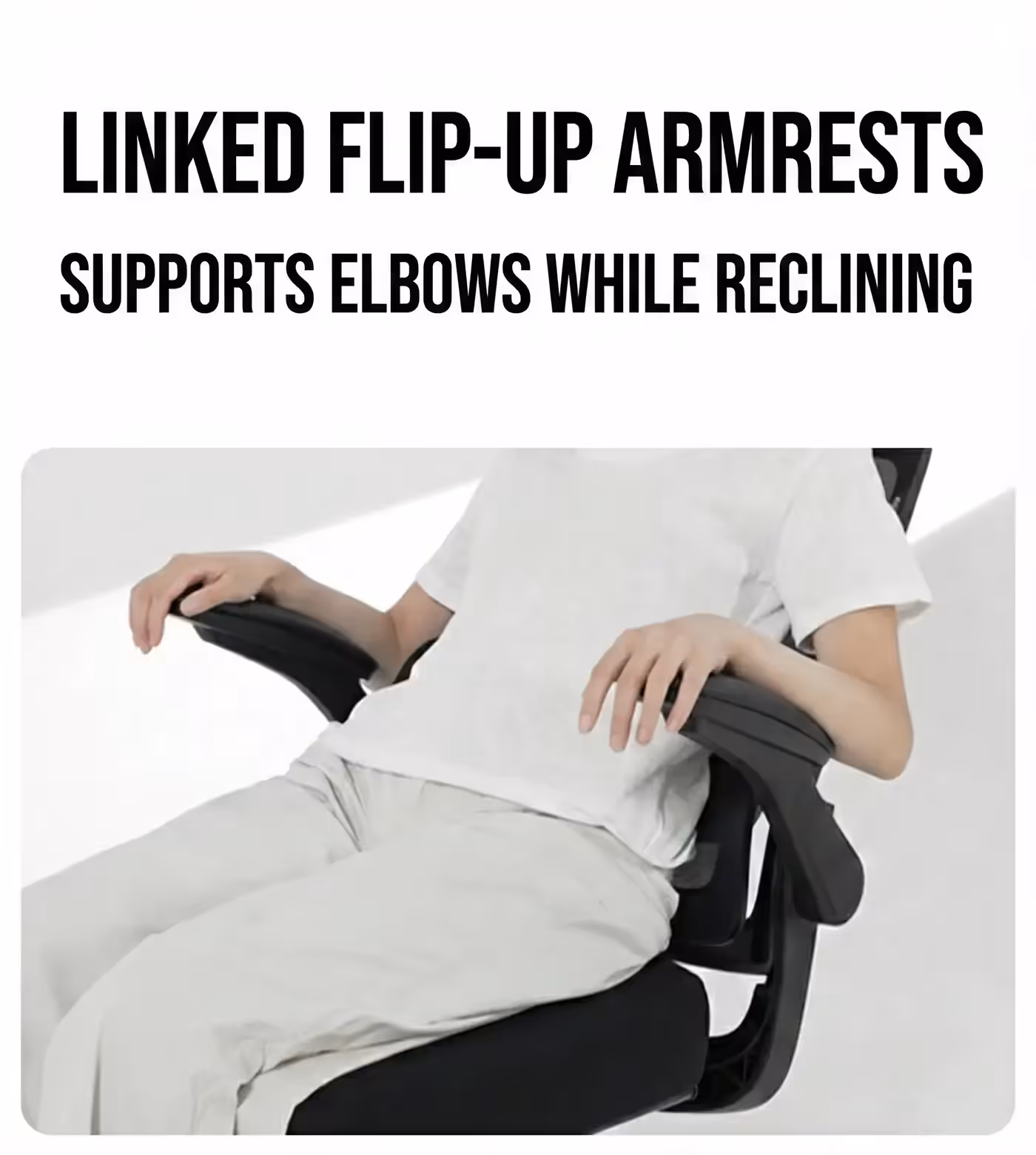 Close-up of the linked armrest supporting a forearm mid-recline