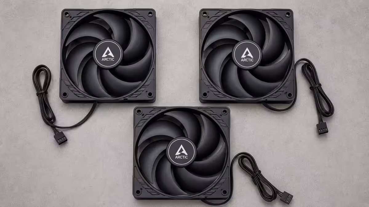 Three Arctic P14 fans laid out flat