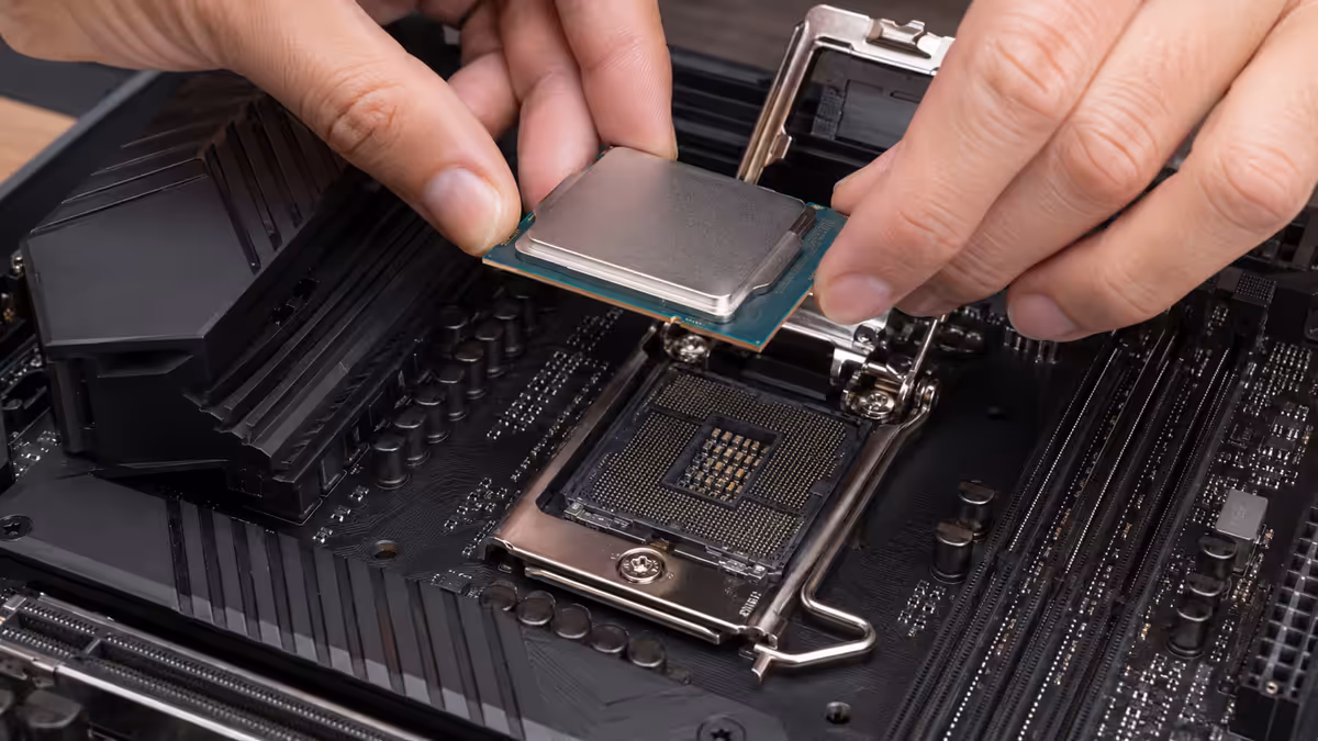 CPU being lowered into socket